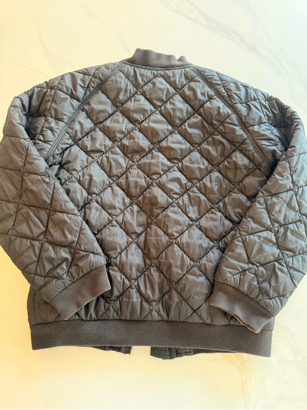 Polo by Ralph Lauren Quilted Bomber Jacket in Black with Orange Pony